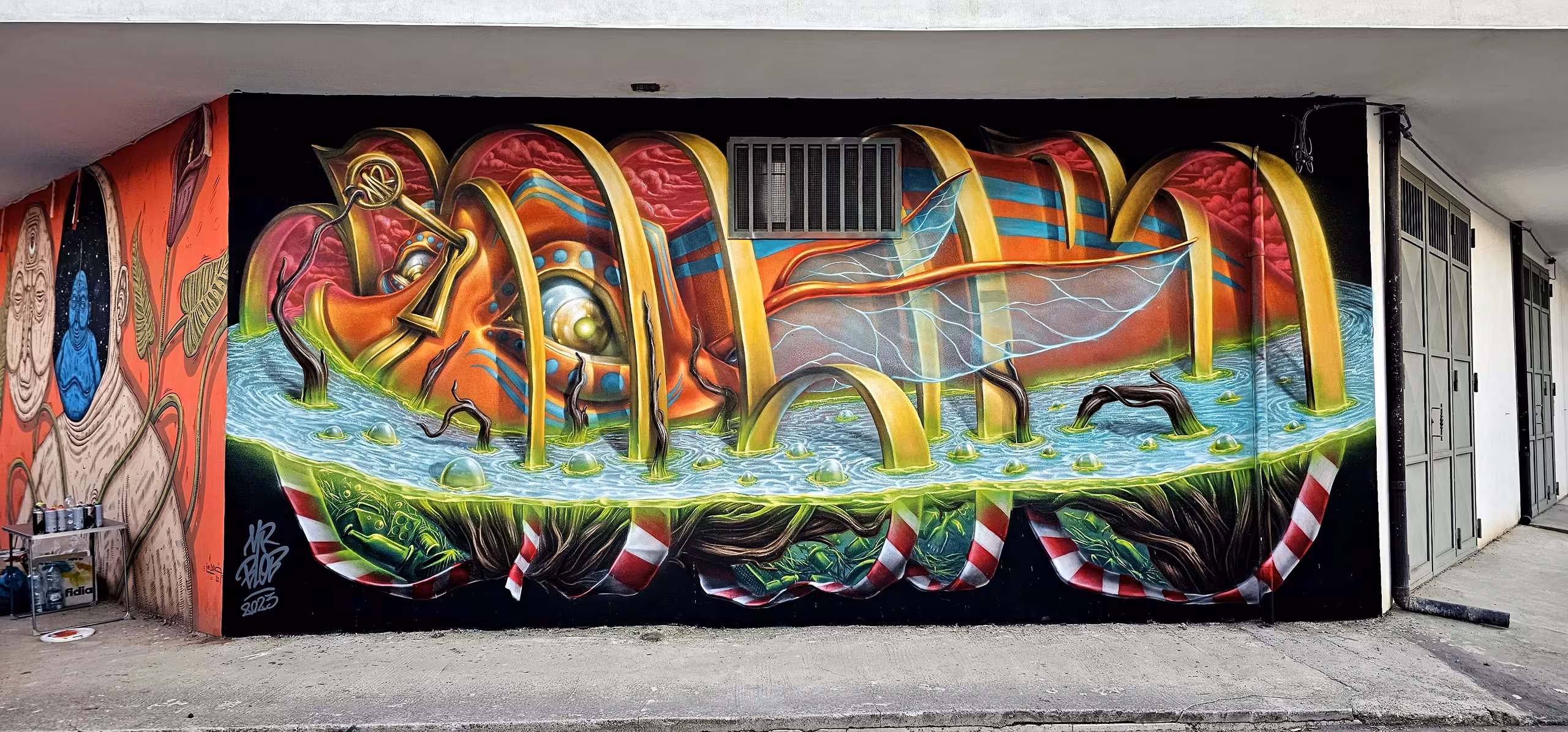 Stunning 3D optical illusion graffiti mural by Mr Blob featuring an abstract surreal character sliced into rings floating in glowing green water with transparent insect wings, painted on a black background.